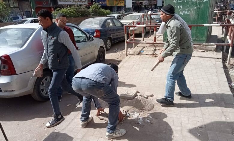 حملات مكثفة لرفع الإشغالات بشوارع حيوية في حي شرق أسيوط
